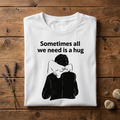 White Sometimes All We Need Is a Hug T-shirt with a humorous feet embrace illustration